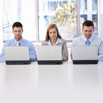 A colour picture of stakeholders working in a business setting symbolising the operations focus of Oakford Group