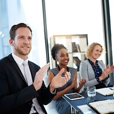People in an office setting symbolising Oakford Group stakeholders